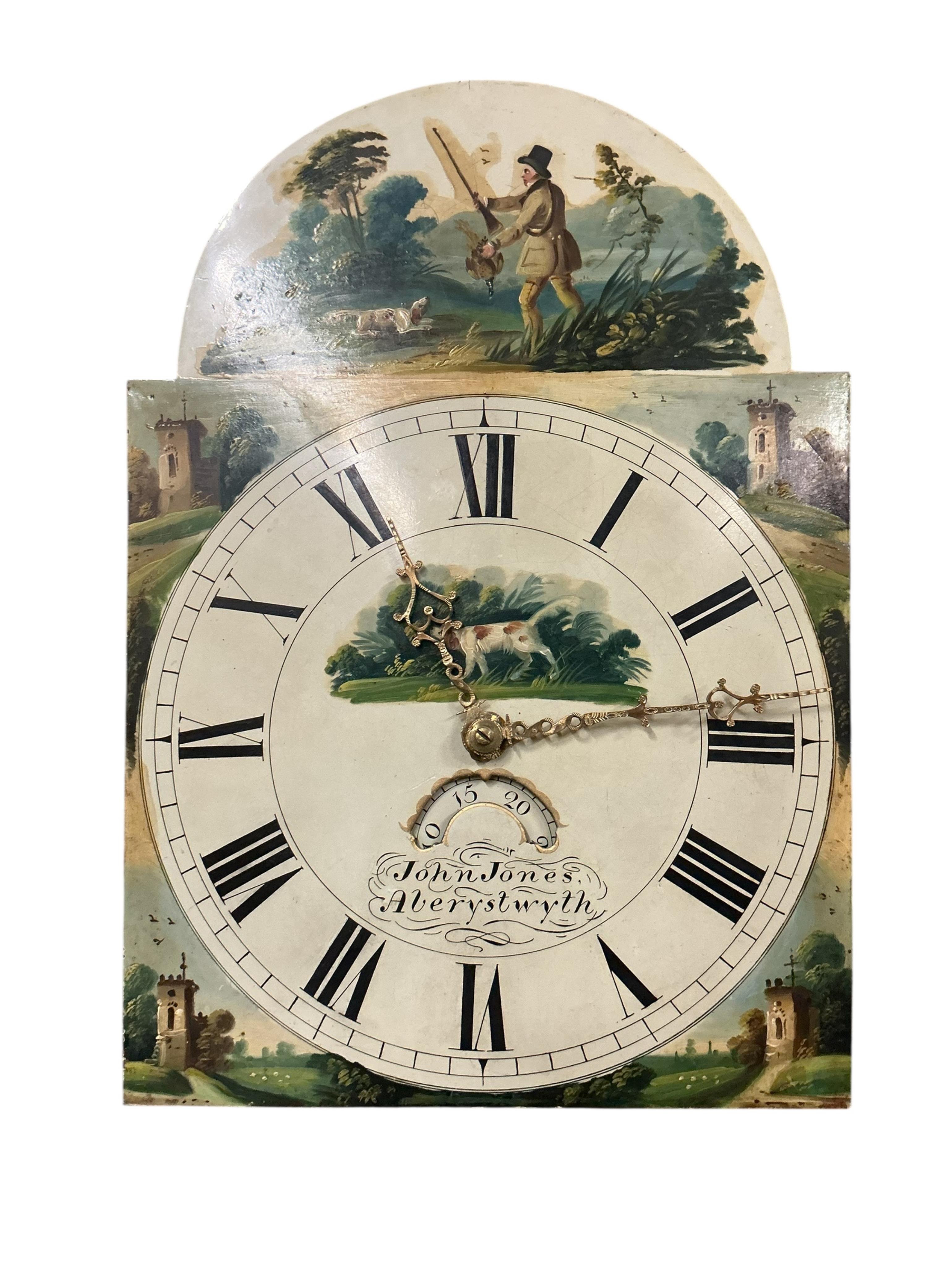 An early 19th century oak and mahogany thirty hour longcase clock, dial signed John Jones, Aberystwyth, height 210cm